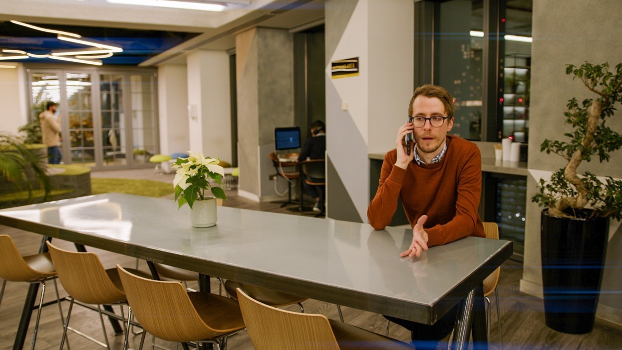 Man demonstrating effective call handling skills