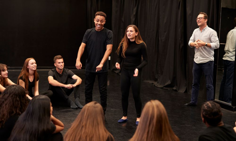 Students attending acting classes in London.