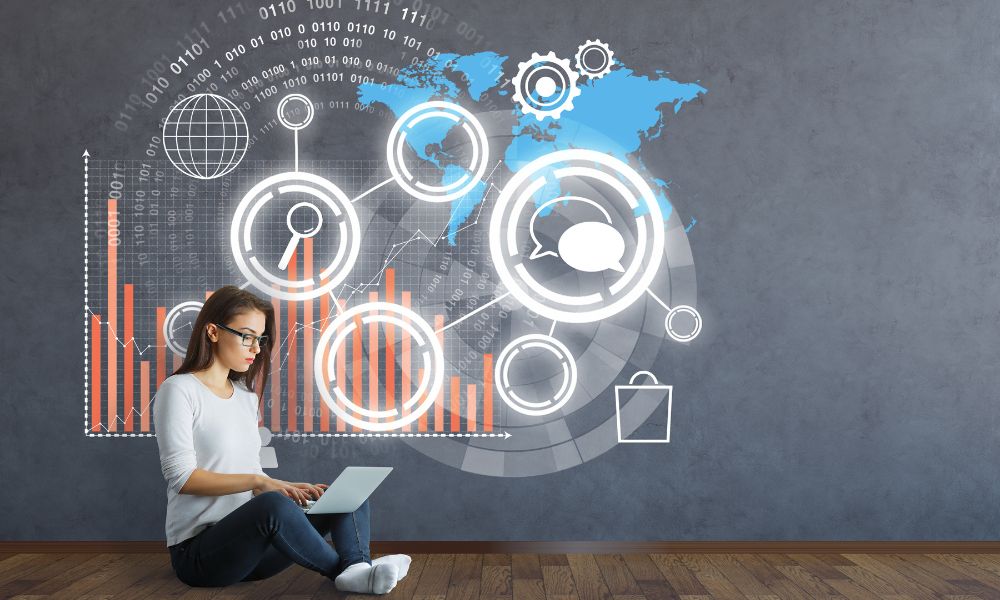 Woman on laptop using various communication channels.