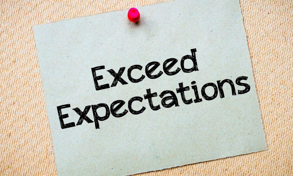 Exceed expectations note on notice board.