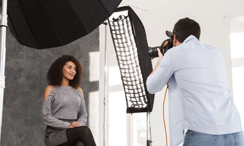 Photographer taking actor headshots.