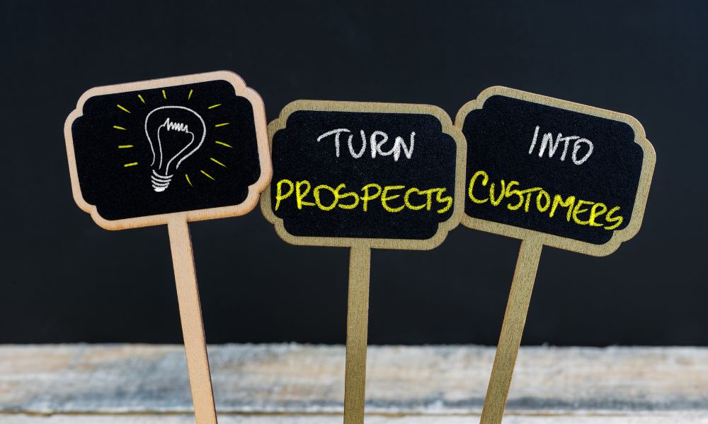 Three signs showing the sales prospecting concept.