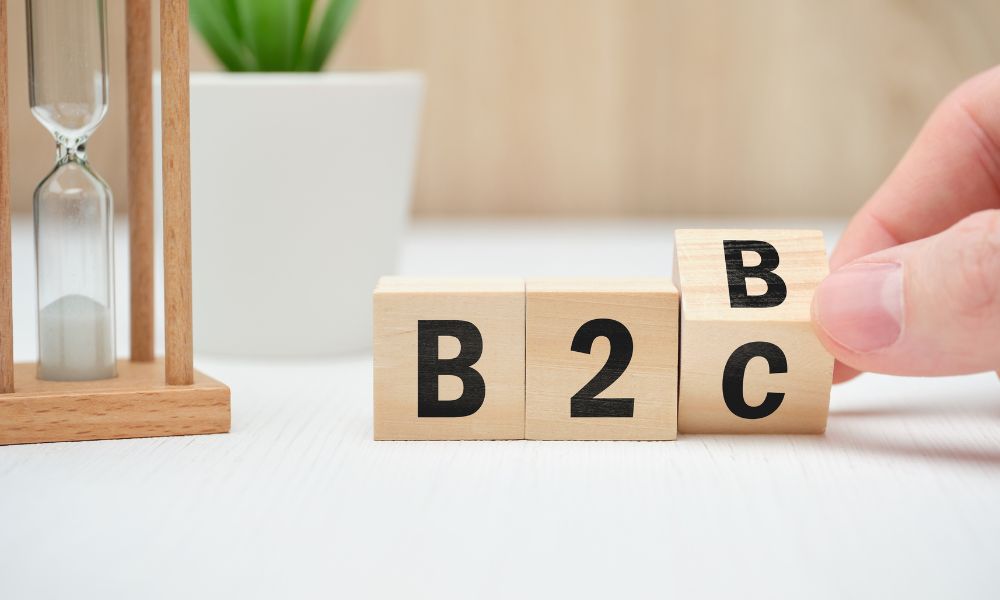 Hourglass and blocks spelling out B2C.