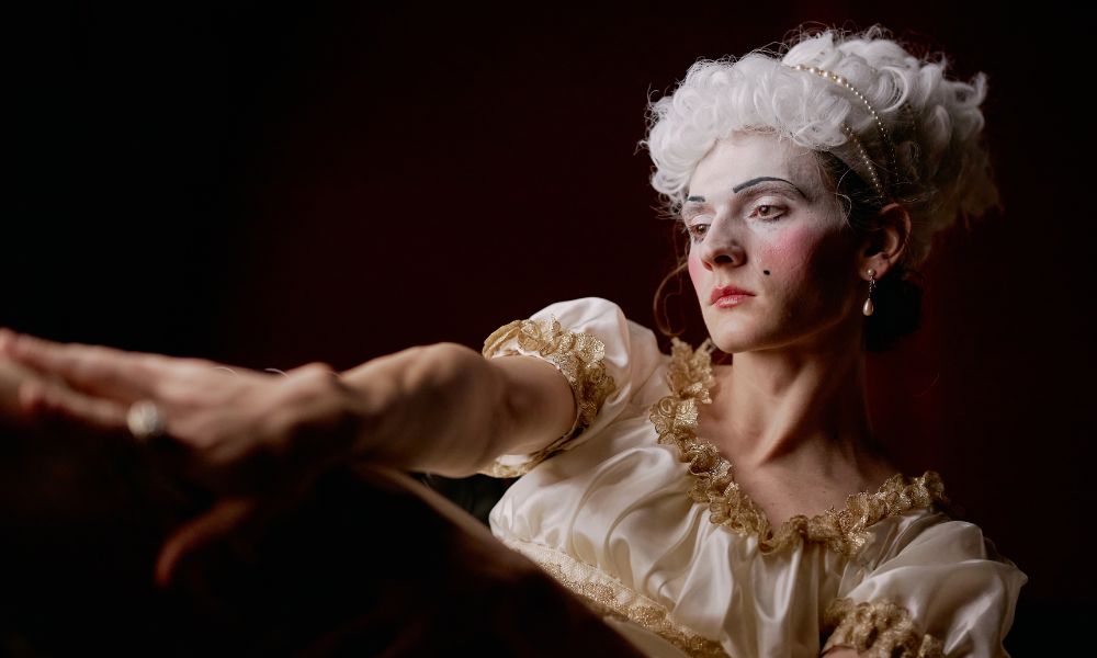 A female actor playing a colourful and eccentric supporting role.